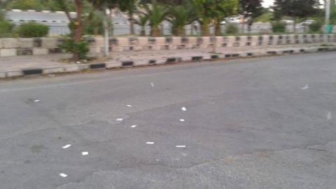 Leaflets on the grounds in the middle of the street. Source of the picture: Syrian Revolutionary Youth page on Facebook.