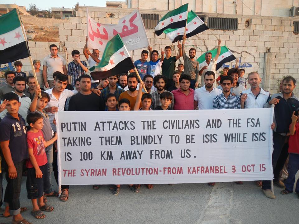 Banner held up by protestors in Kafranbel against Russian intervention in Syria/Activist Raed Fares’s Facebook page