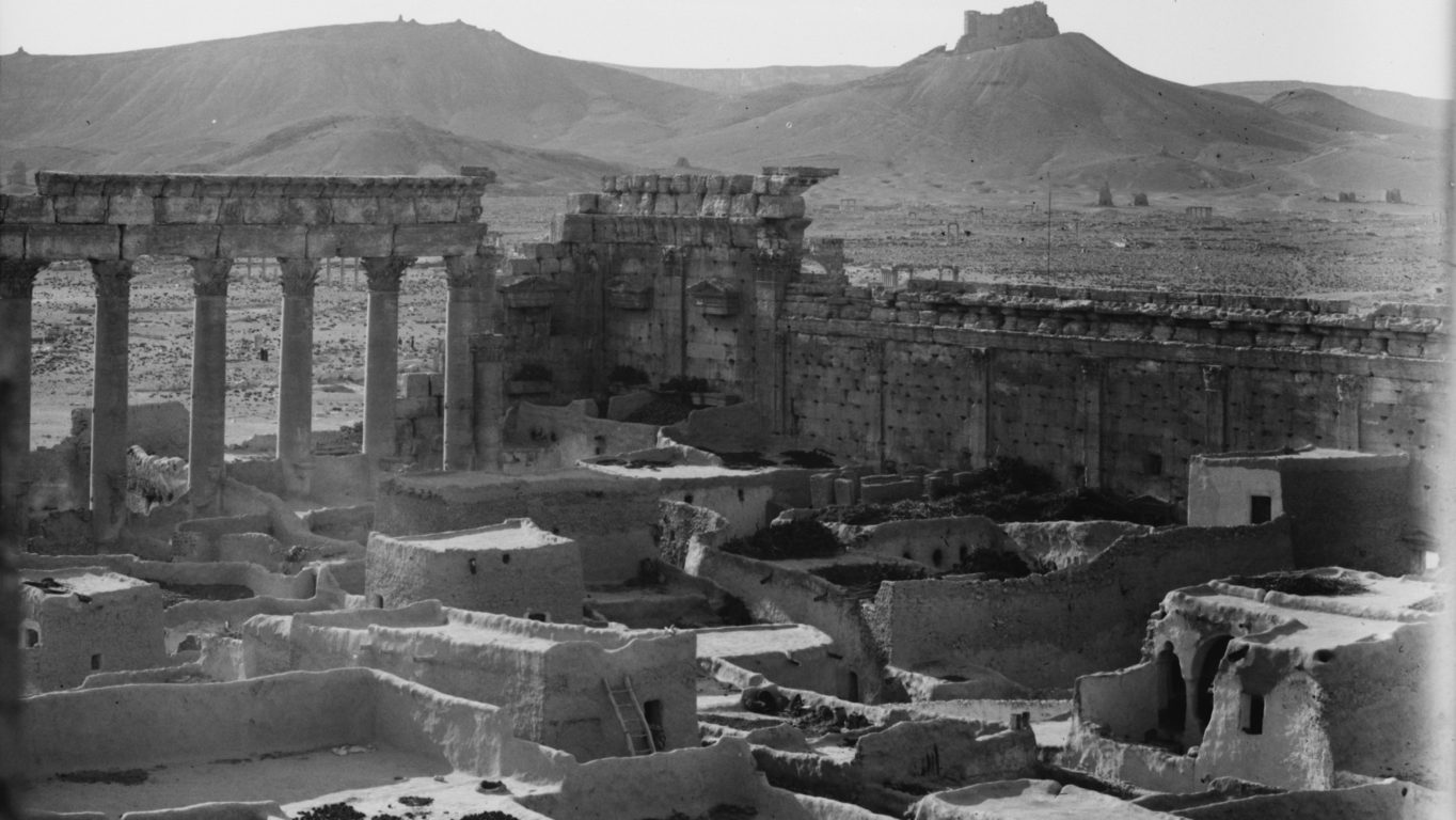 [Photo: Residential buildings of Palmyra and the angle of the temple fence. Early 20th century. (loc.gov/public domain)].