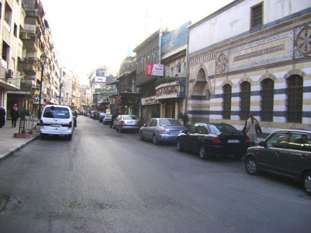 [Photo: Jezmatiyah street - Midan neighborhood - Damascus - 31-10-2007 (Wesamt/CC BY-SA 3.0 via Wikimedia Commons)].
