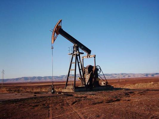 [Photo: Oil extraction in the Rumaylan field - al-Hasakah - 21-7-06 (Aram 33/Public Domain via Wikimedia Commons)]. 