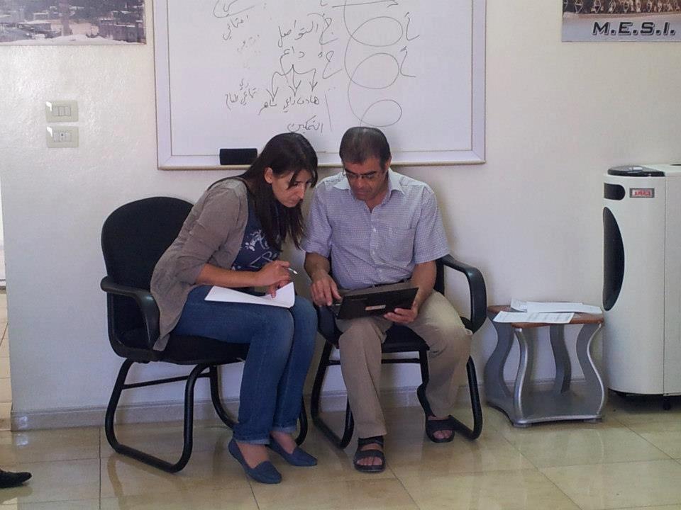 [Photo: Dr. Jalal Nofal with psychologist Wifa' al-Hayek - Yabrud - Rif Dimashq - 7-9-2012 (Yabrud Ahl al-Khayr Facebook Page)].