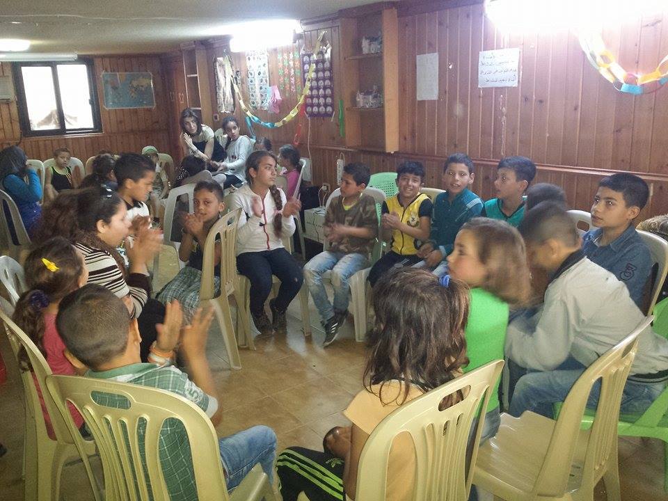 [Photo: One of the children’s activities organized by ʻObour” for displaced children - Tartus - 13-4-2016 (ʻObour Facebook Page)].